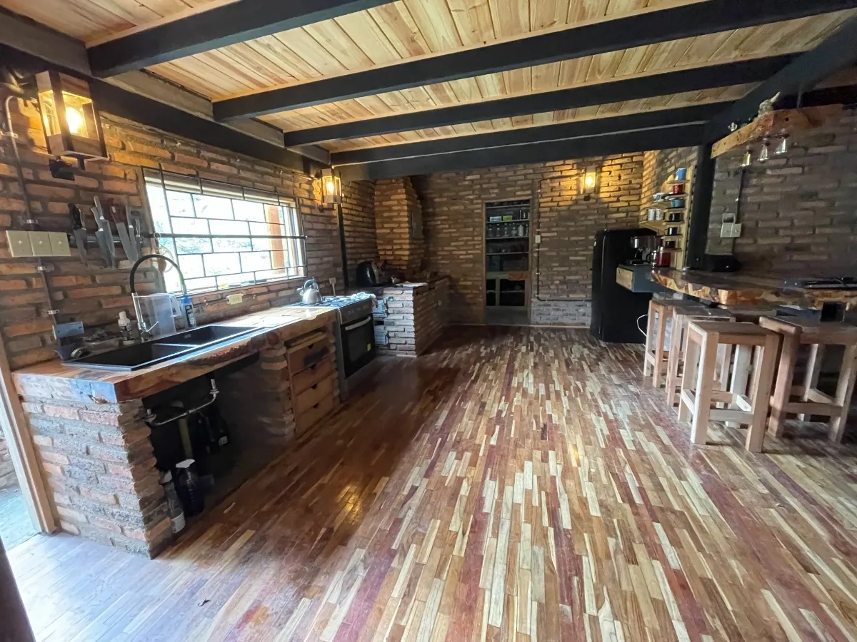 Kitchen in wood and brick
